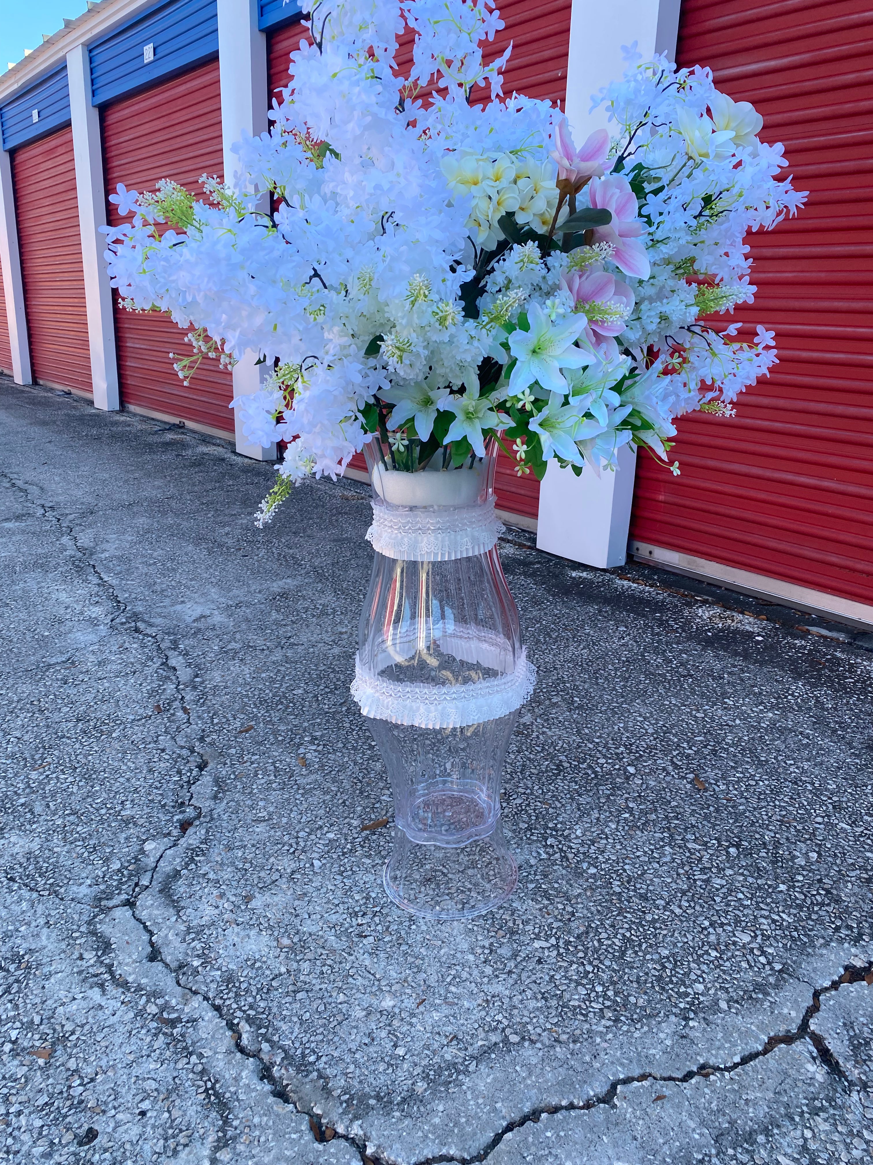 White flower arrangement with hight vase