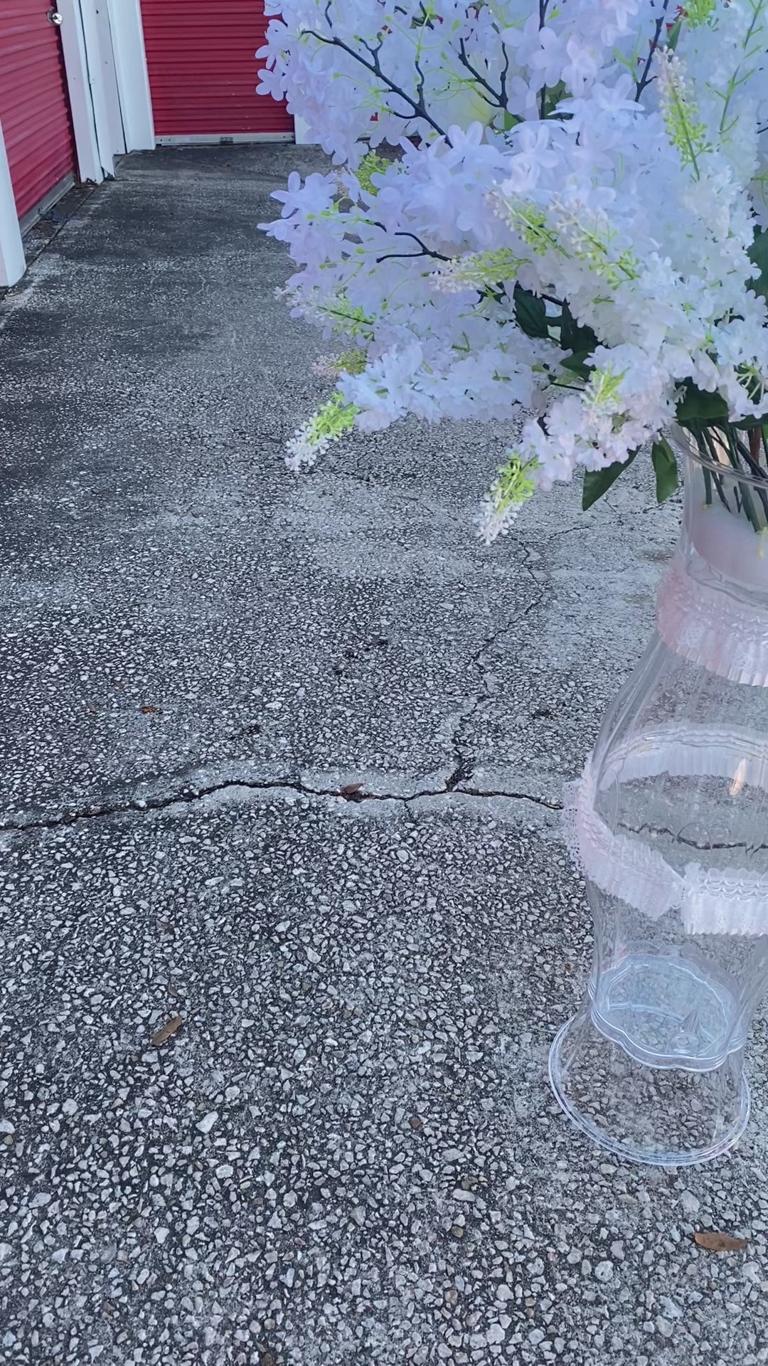 White flower arrangement with hight vase